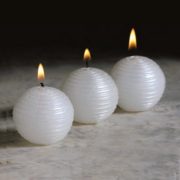 white metallic ball candles