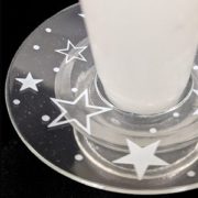 Close up view of silver star design candle bobeche