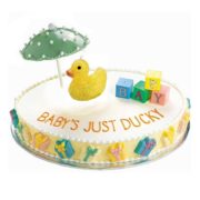 Rubber Ducky candle on baby shower cake