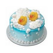 little duck candle on baby shower cake