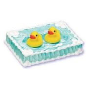 Rubber Ducky candles on baby shower cake