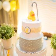 Rubber Ducky candle on top of cake for baby shower