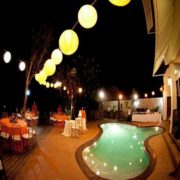 candles enhance poolside wedding