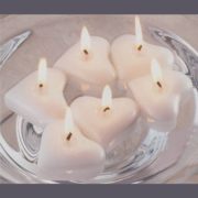 white floating heart candles
