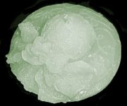 Green colored Victorian lace hat candle