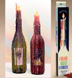 colorful drip taper candles used on wine bottle