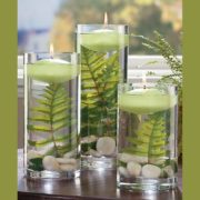 floating candle centerpiece with fern fronds