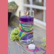 floating candle centerpiece using colored sand