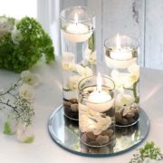 floating candles in glass cylinders